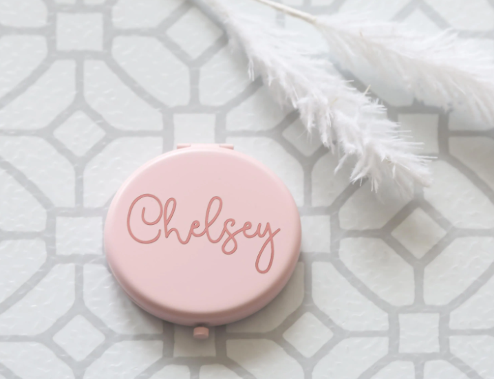 Pink compact mirror with 'Chelsey' in rose gold vinyl